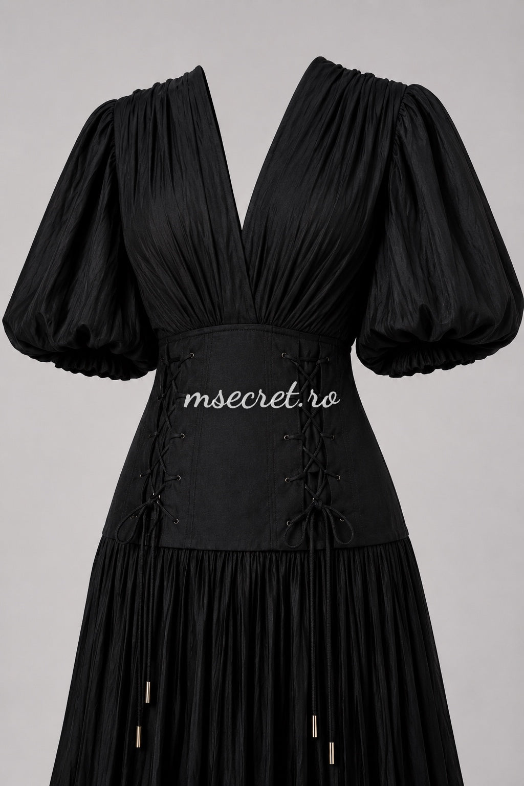 Elegant long black dress with a corset and pleated skirt – evening gown with puff sleeves