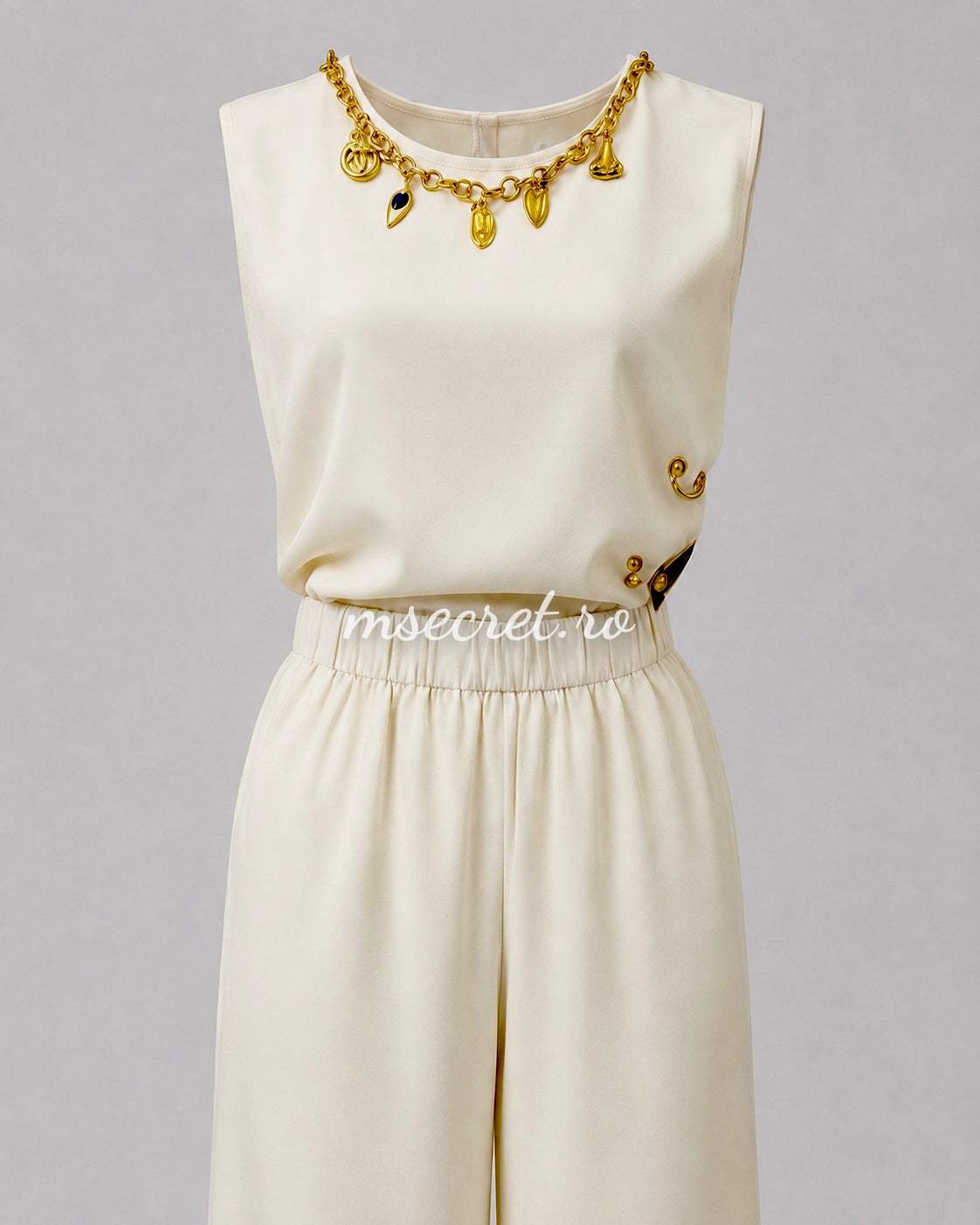 Compleu crem cu top accesorizat si pantaloni palazzo