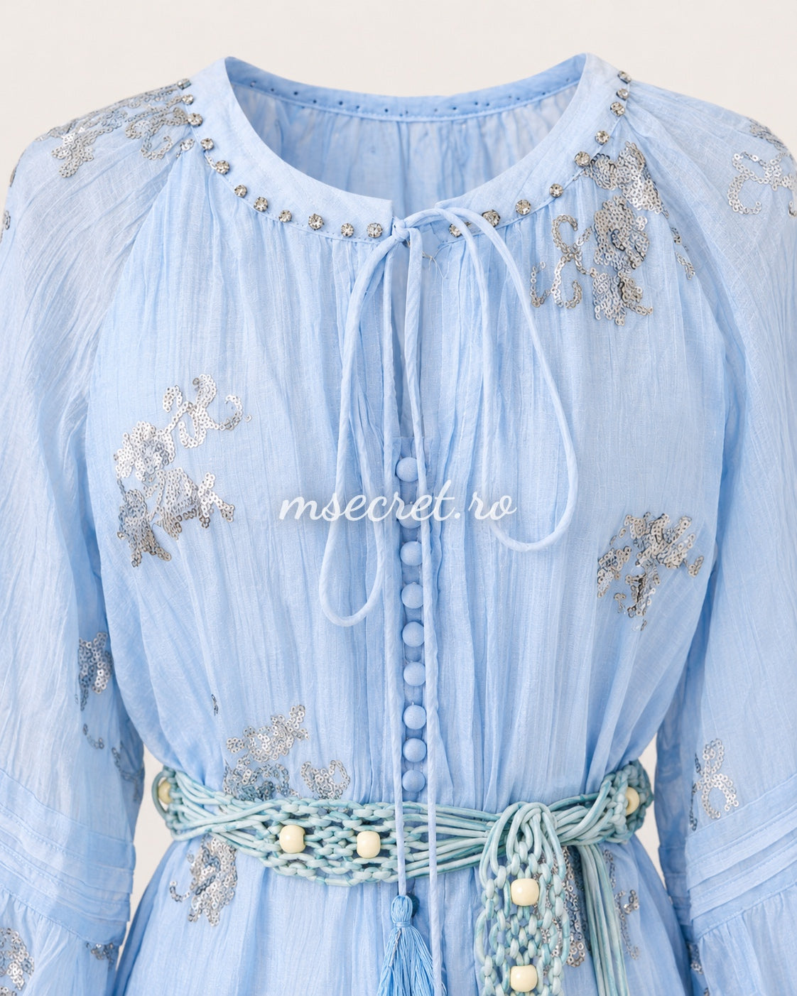 Short blue sequined dress with decorative belt