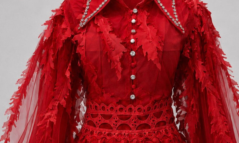 Red midi dress with stones and 3D design