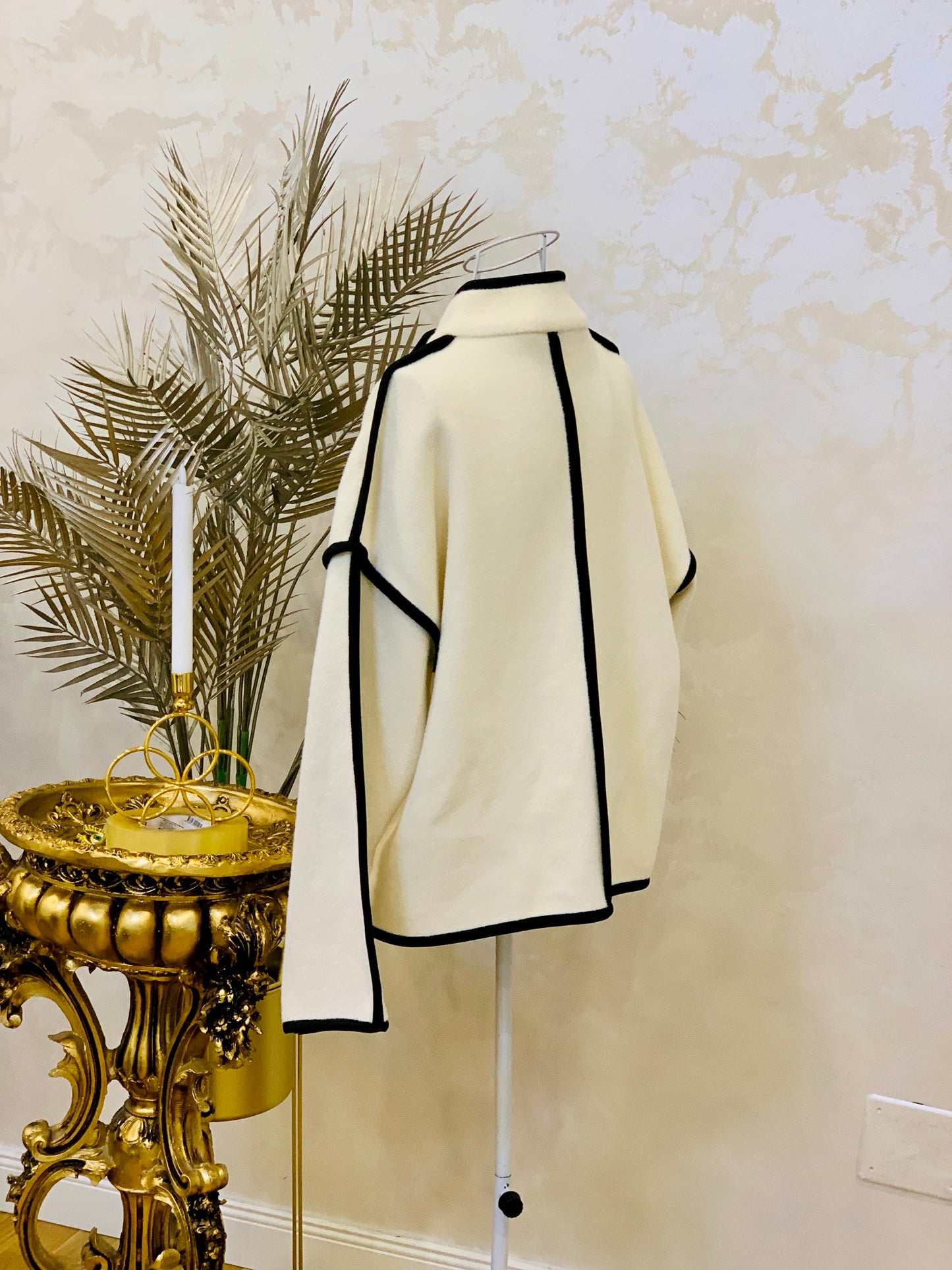 Cream jacket with black inserts