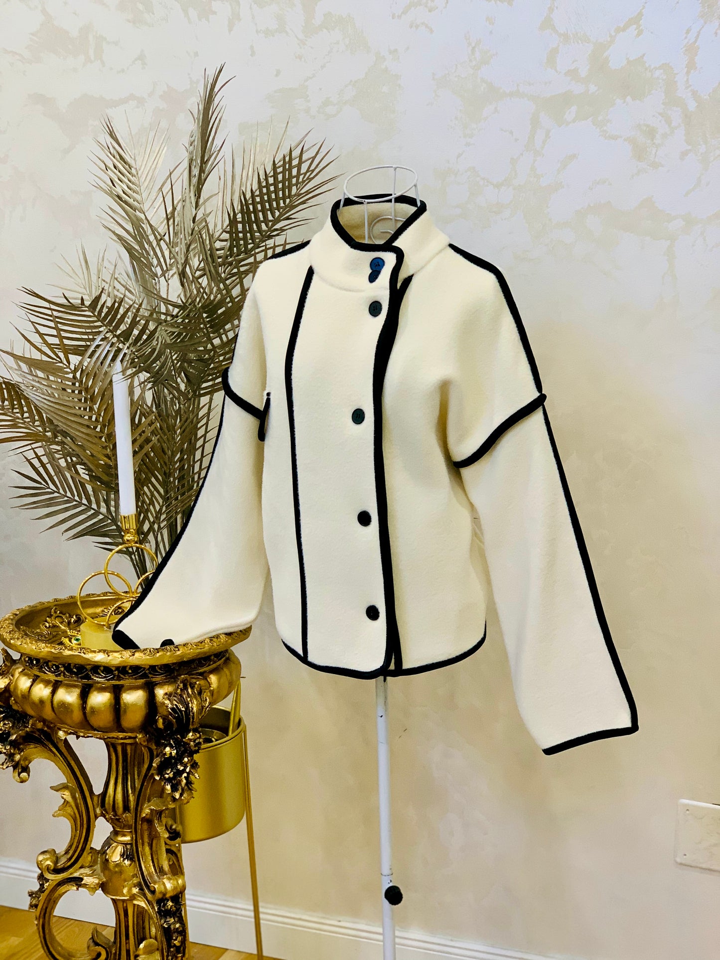 Cream jacket with black inserts