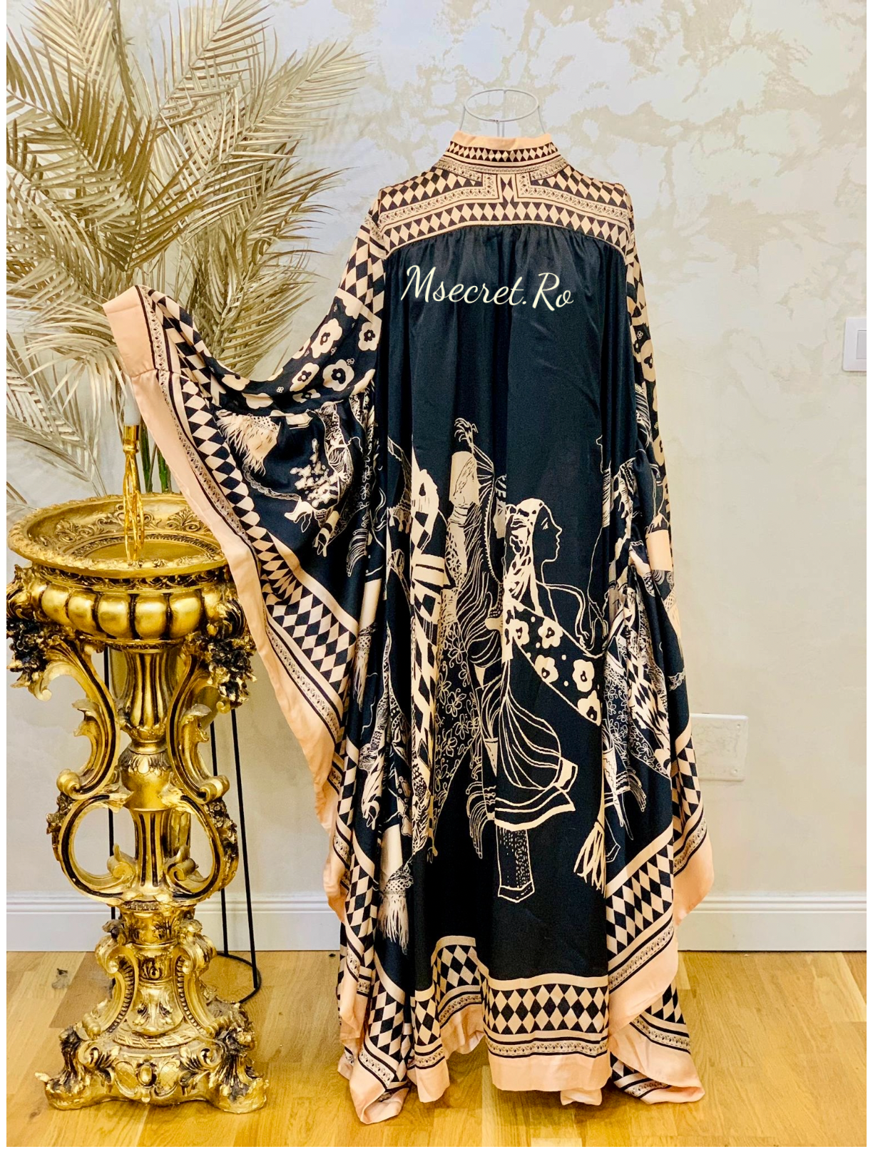 Long diaphanous dress with graphic print and geometric details
