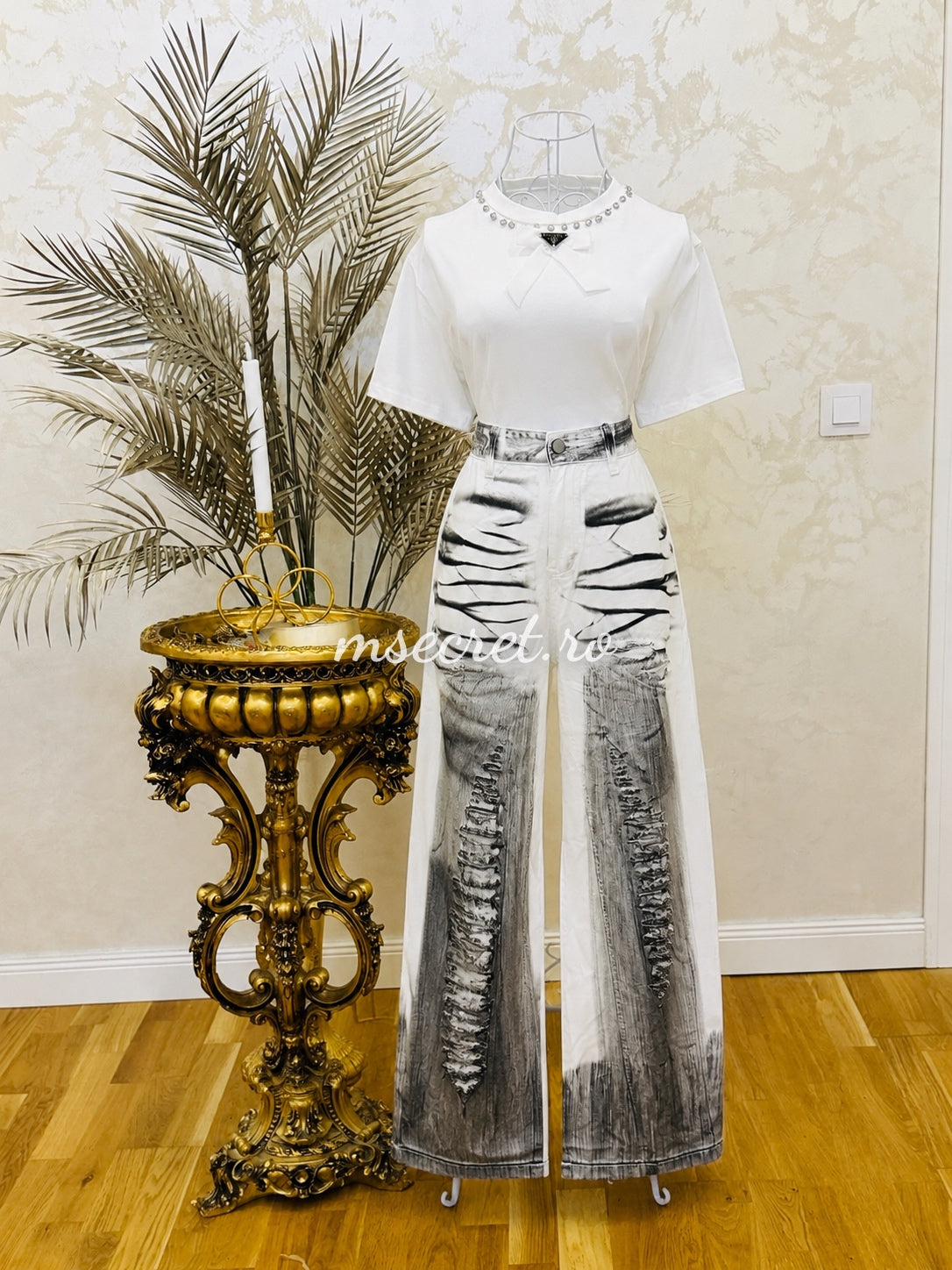 Black and white wide-leg jeans with artistic print