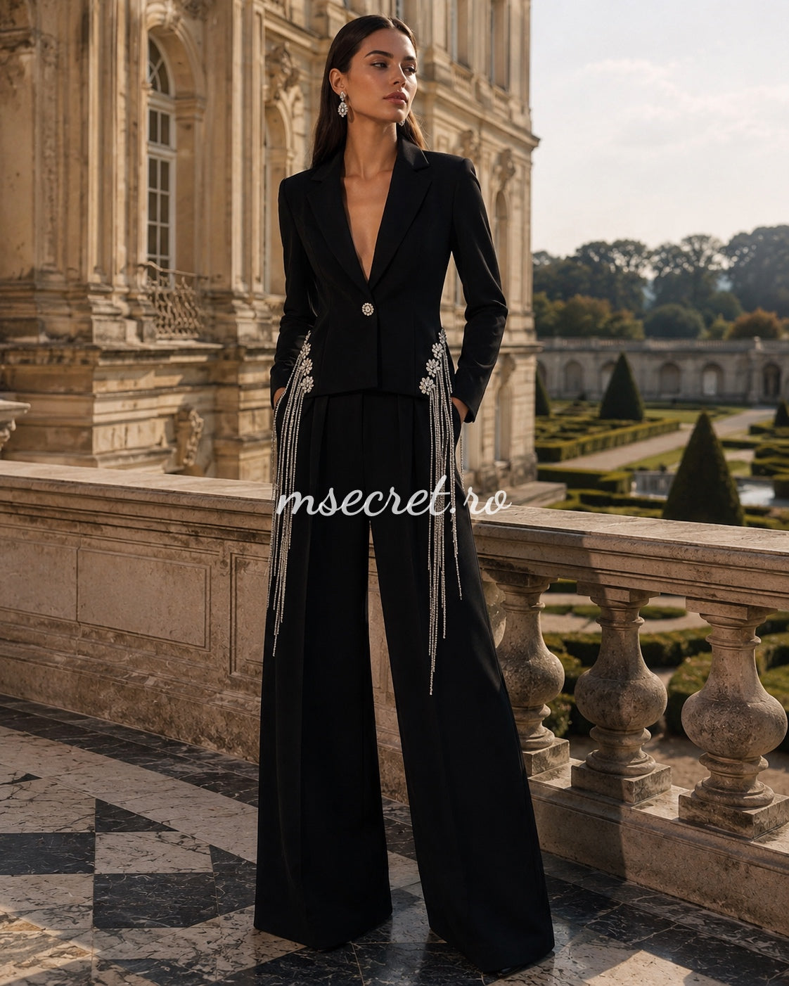 Elegant black suit with a jacket and flared trousers