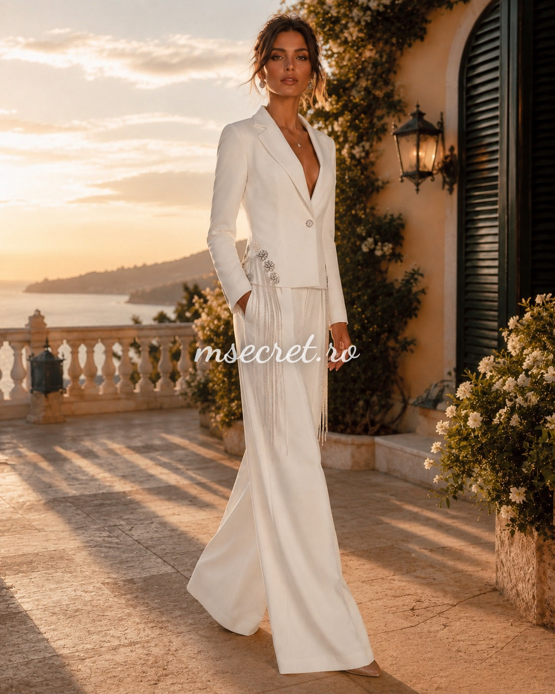 Elegant white suit with a blazer and flared trousers