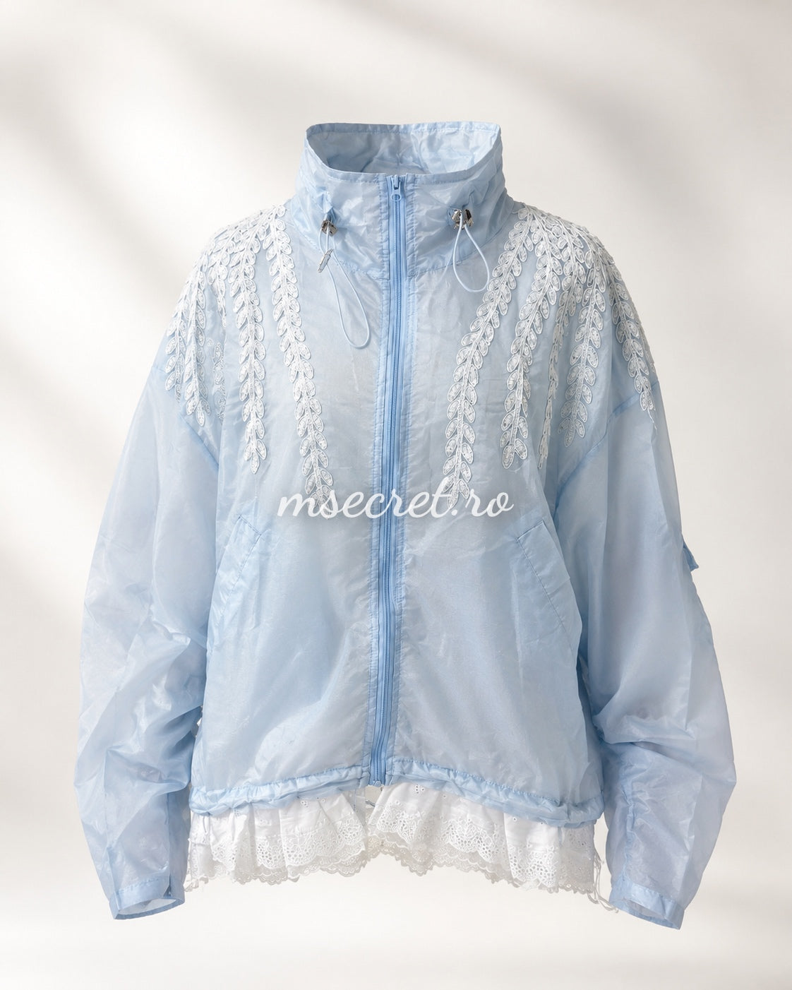 Blue jacket with floral embroidery and tulle ruffles