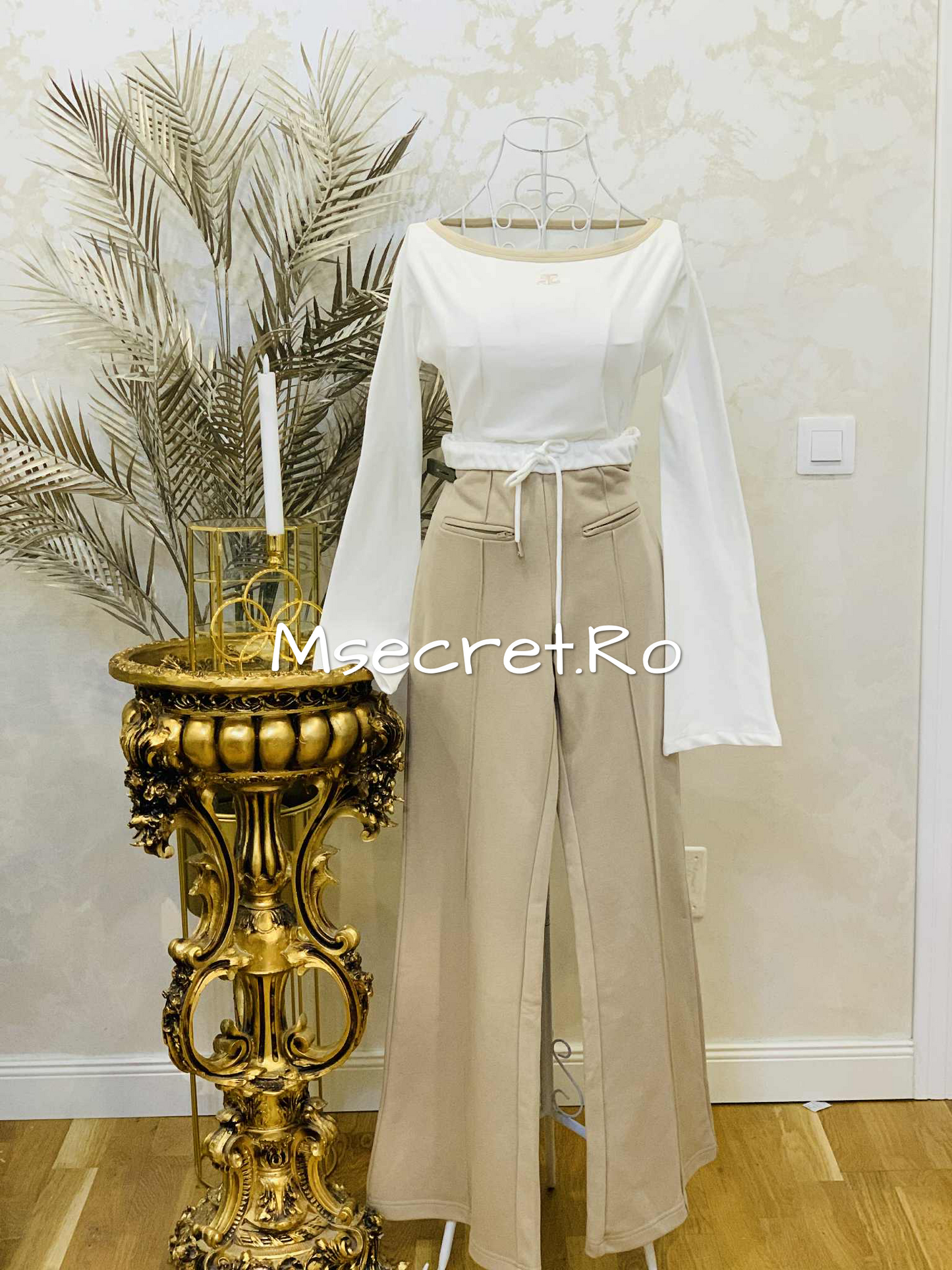 Cream set with blouse and flared trousers