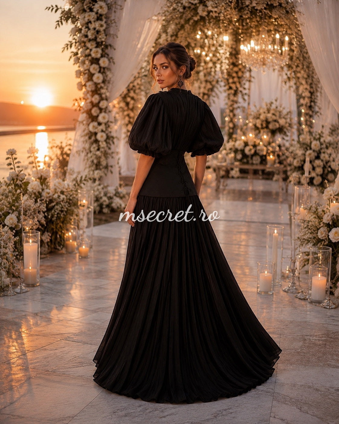 Elegant long black dress with a corset and pleated skirt – evening gown with puff sleeves