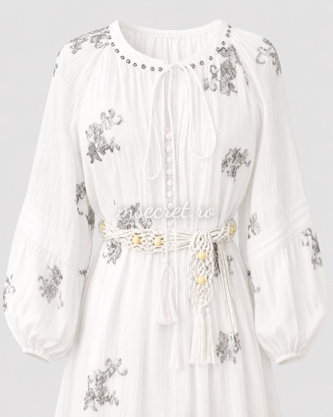 Short white dress with sequins and decorative belt