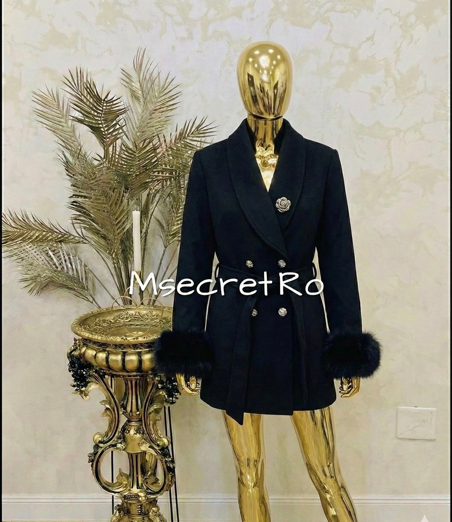 Short black wool coat with natural fur cuffs