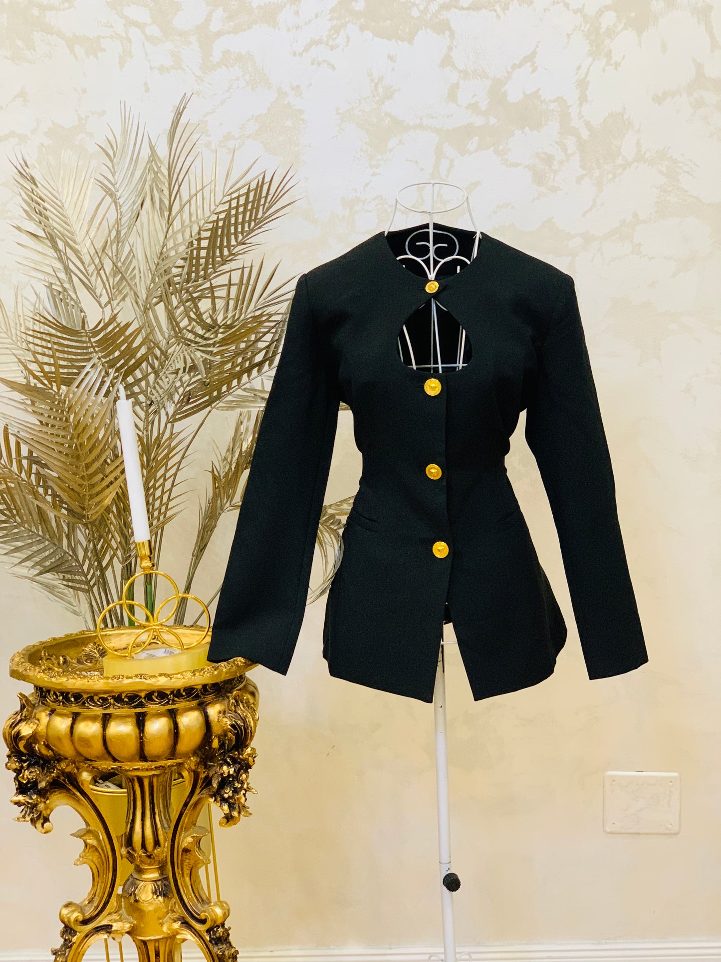 Elegant black blazer with gold details