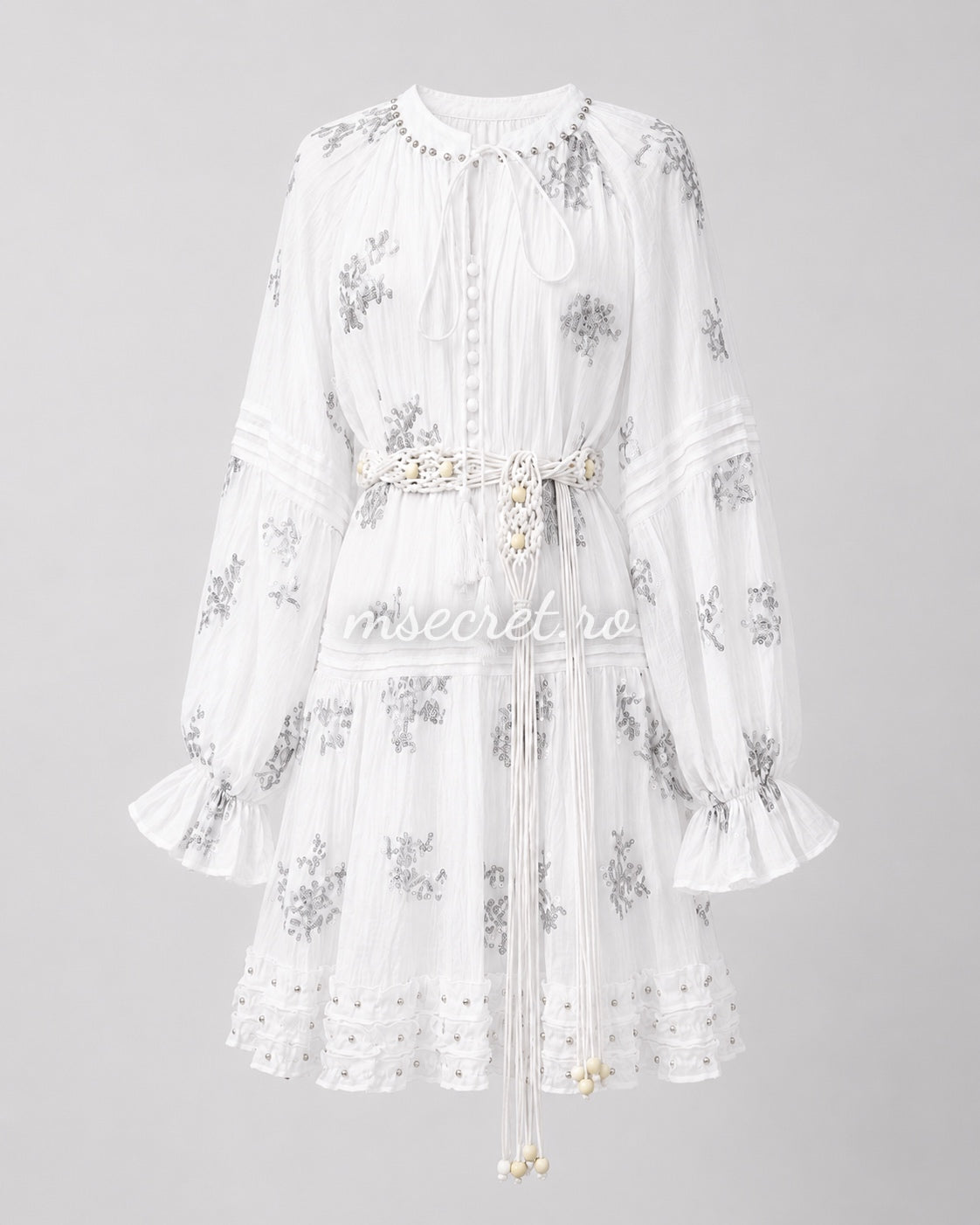 Short white dress with sequins and decorative belt