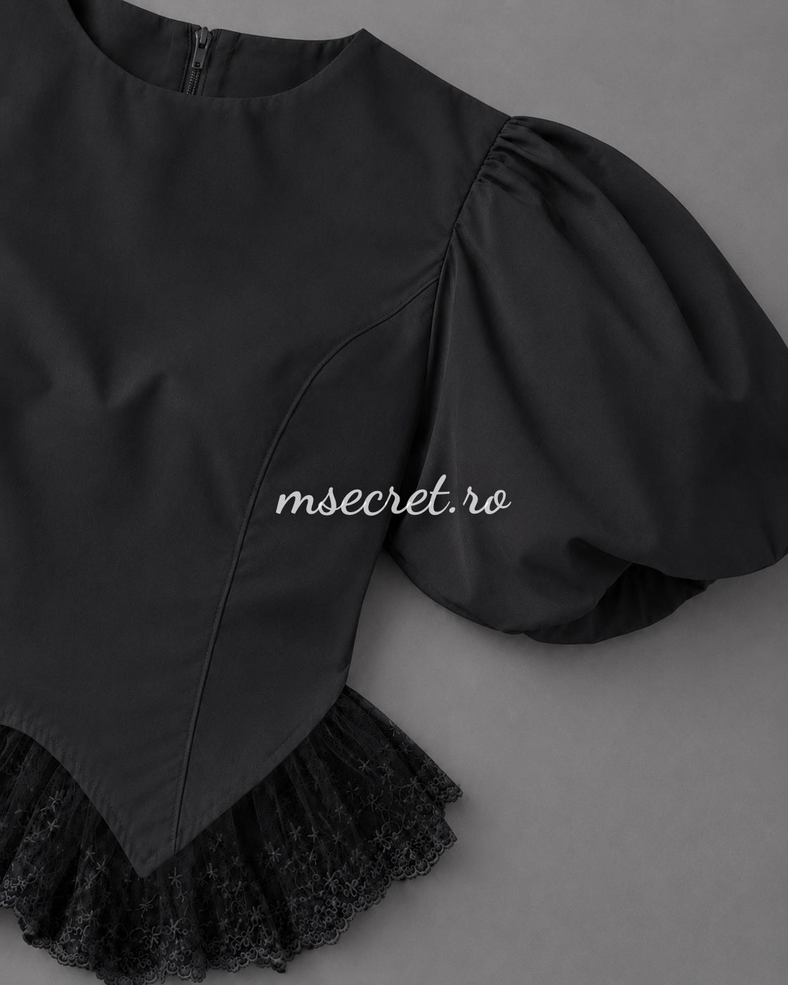 Black shirt with puffed sleeves and embroidered tulle detail
