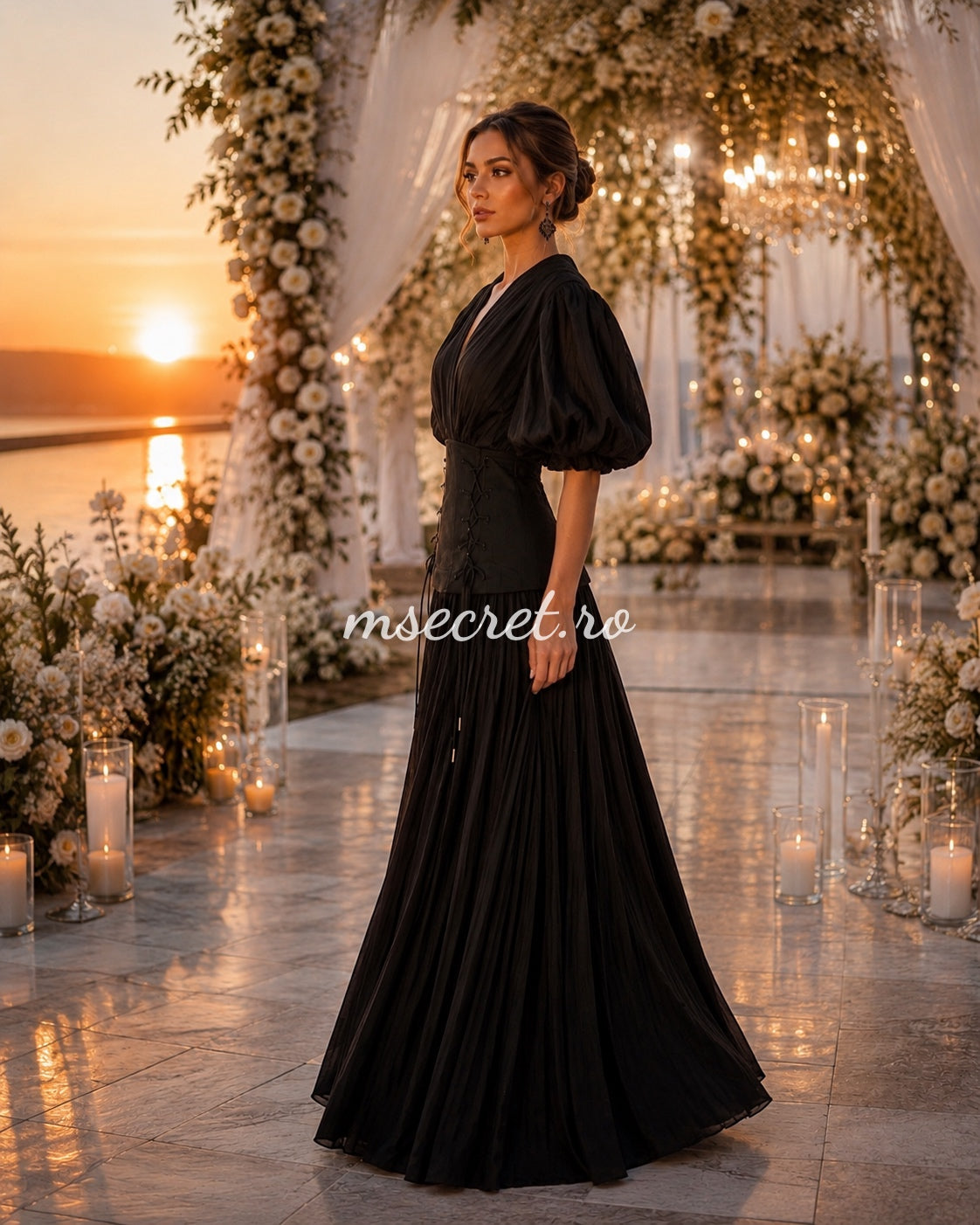 Elegant long black dress with a corset and pleated skirt – evening gown with puff sleeves