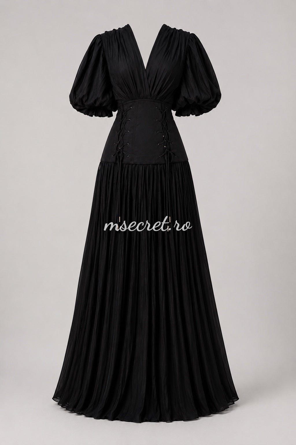 Elegant long black dress with a corset and pleated skirt – evening gown with puff sleeves