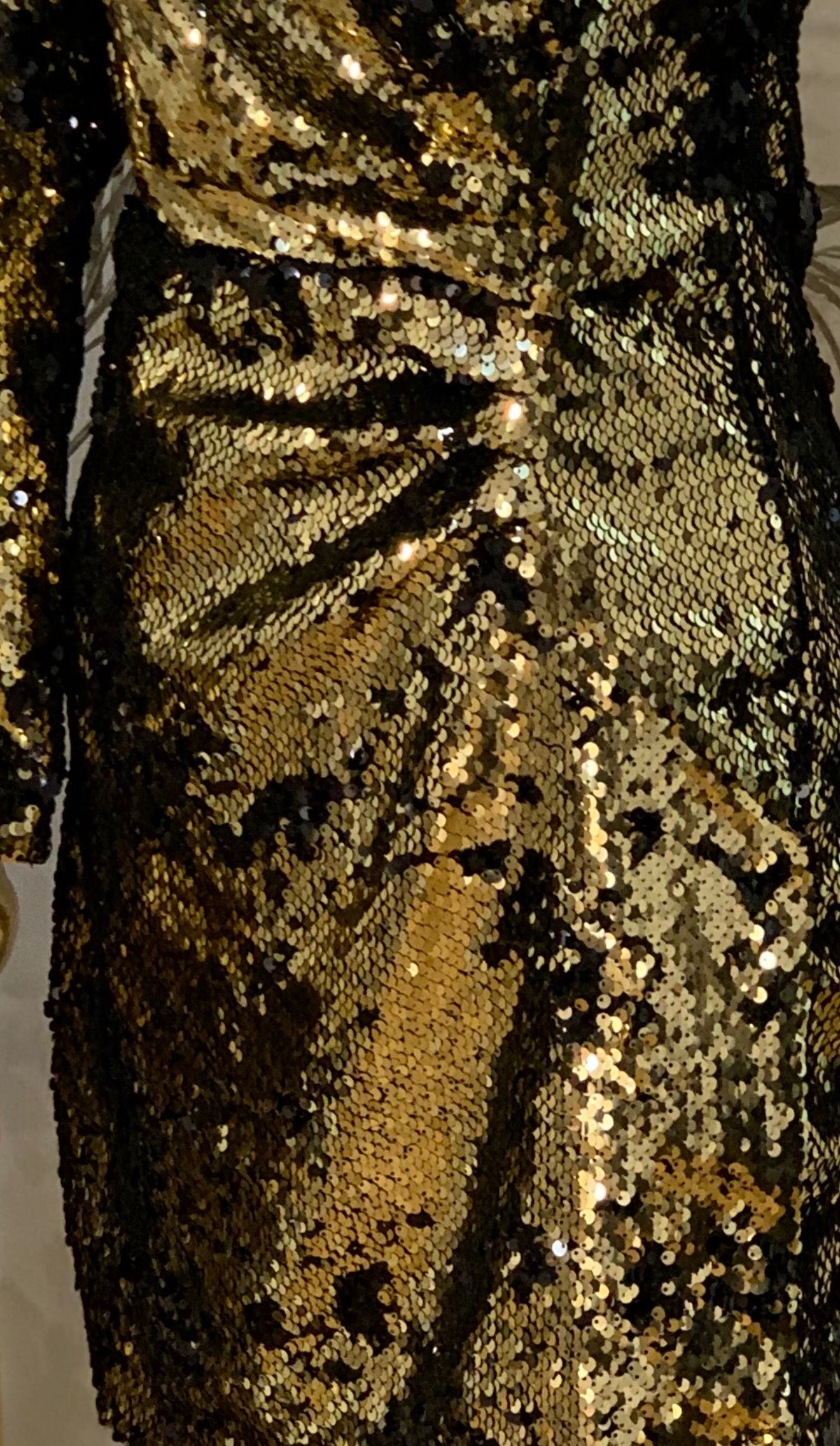 Black and gold sequined dress