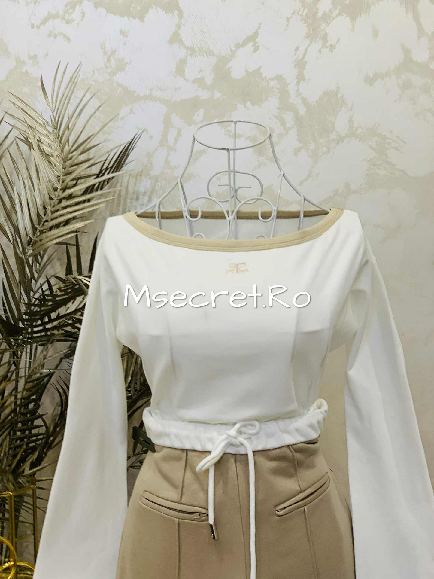 Cream set with blouse and flared trousers