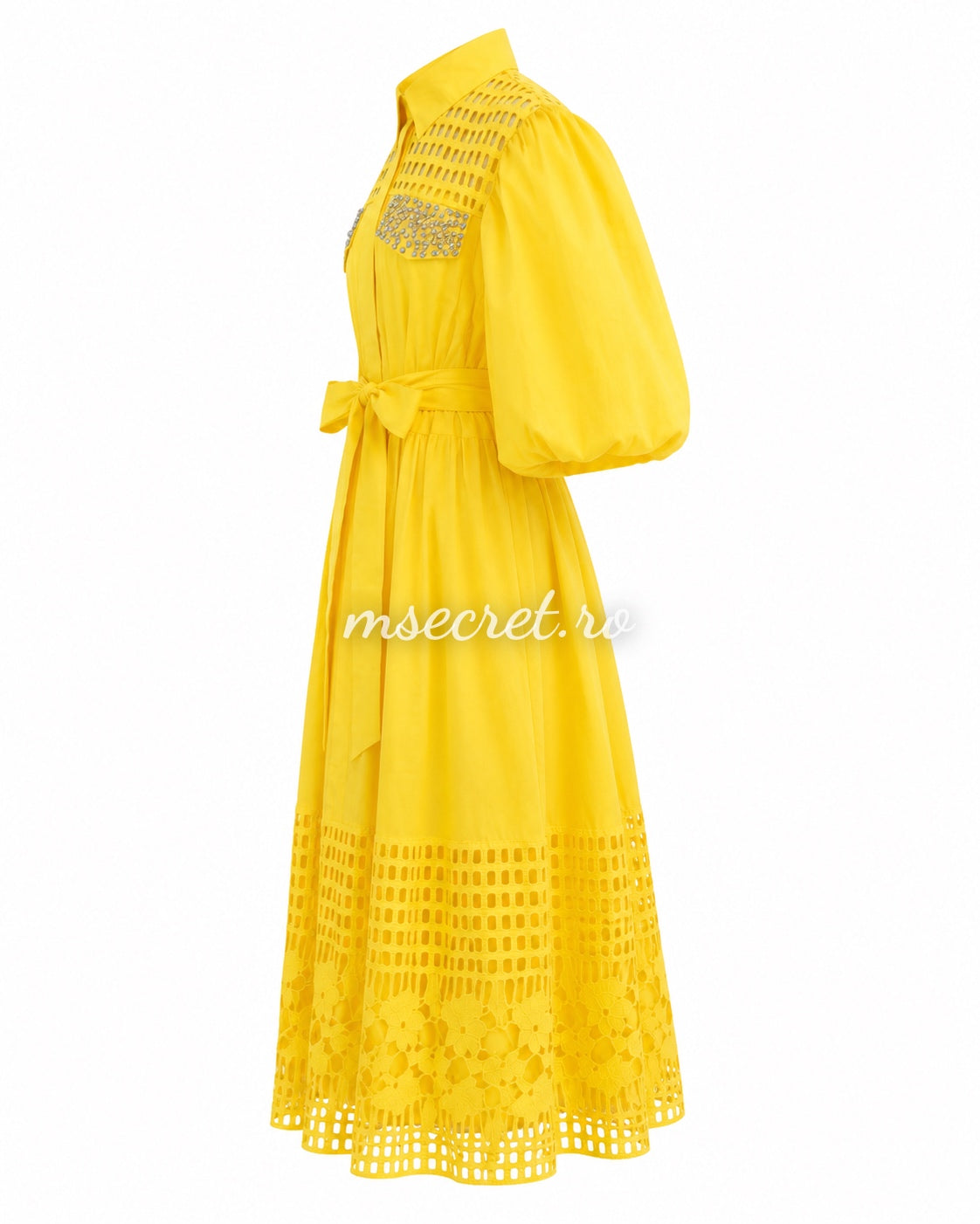 Yellow dress with perforated embroidery and sparkling appliques