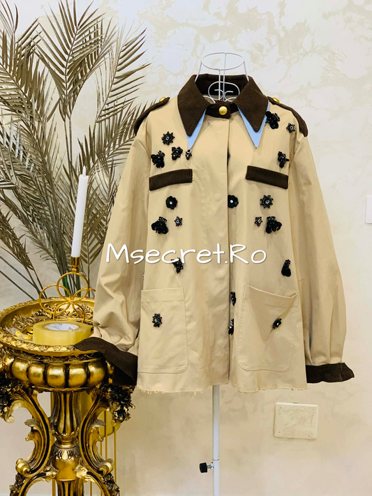 Beige jacket with 3D appliqués