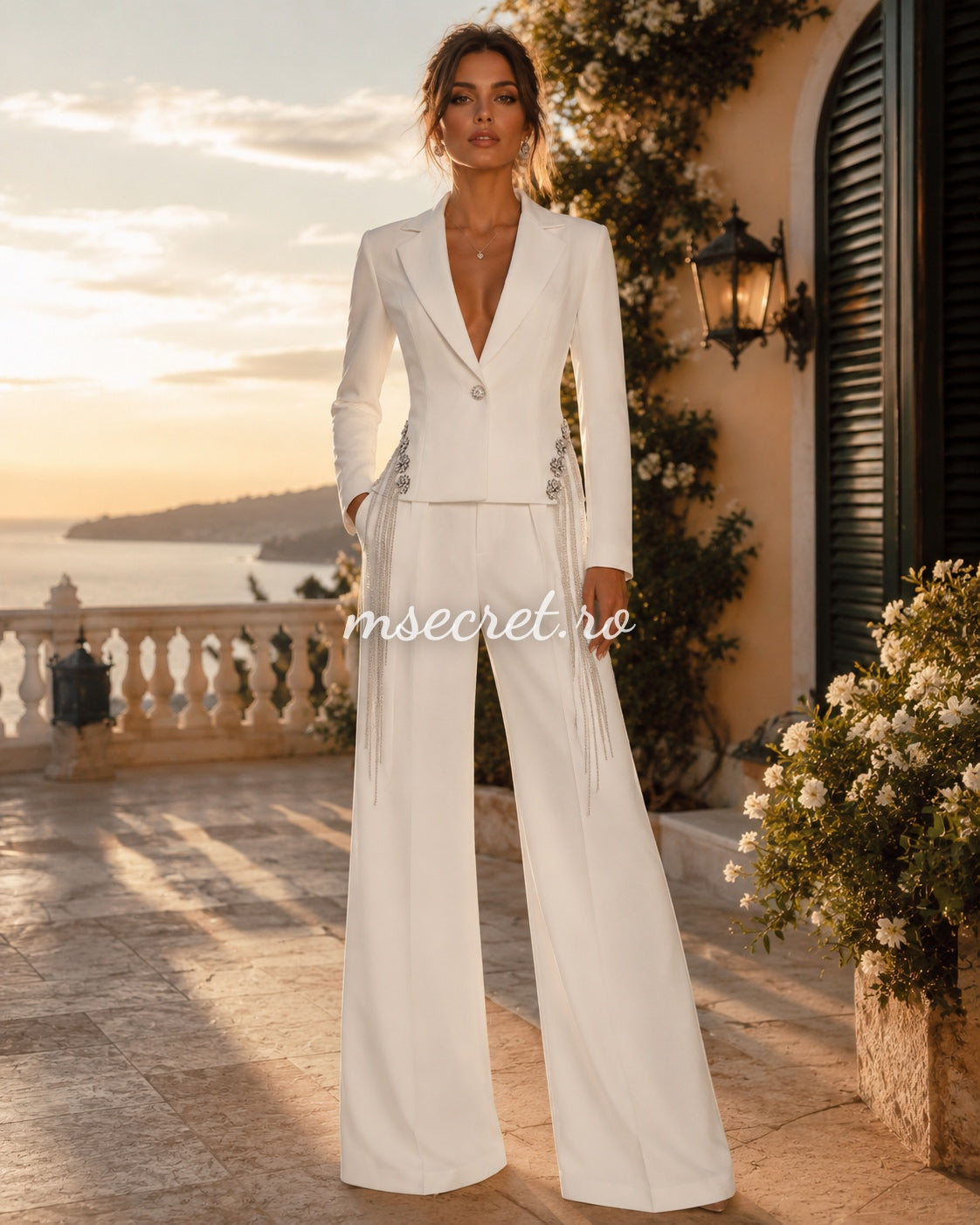 Elegant white suit with a blazer and flared trousers