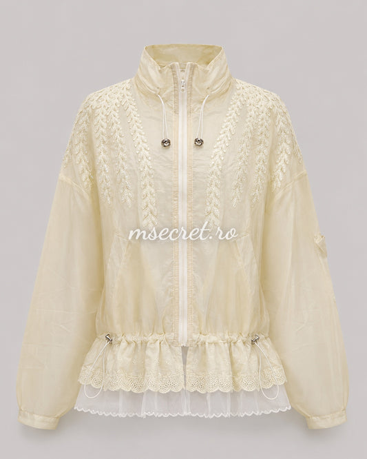 Cream jacket with floral embroidery and tulle ruffles