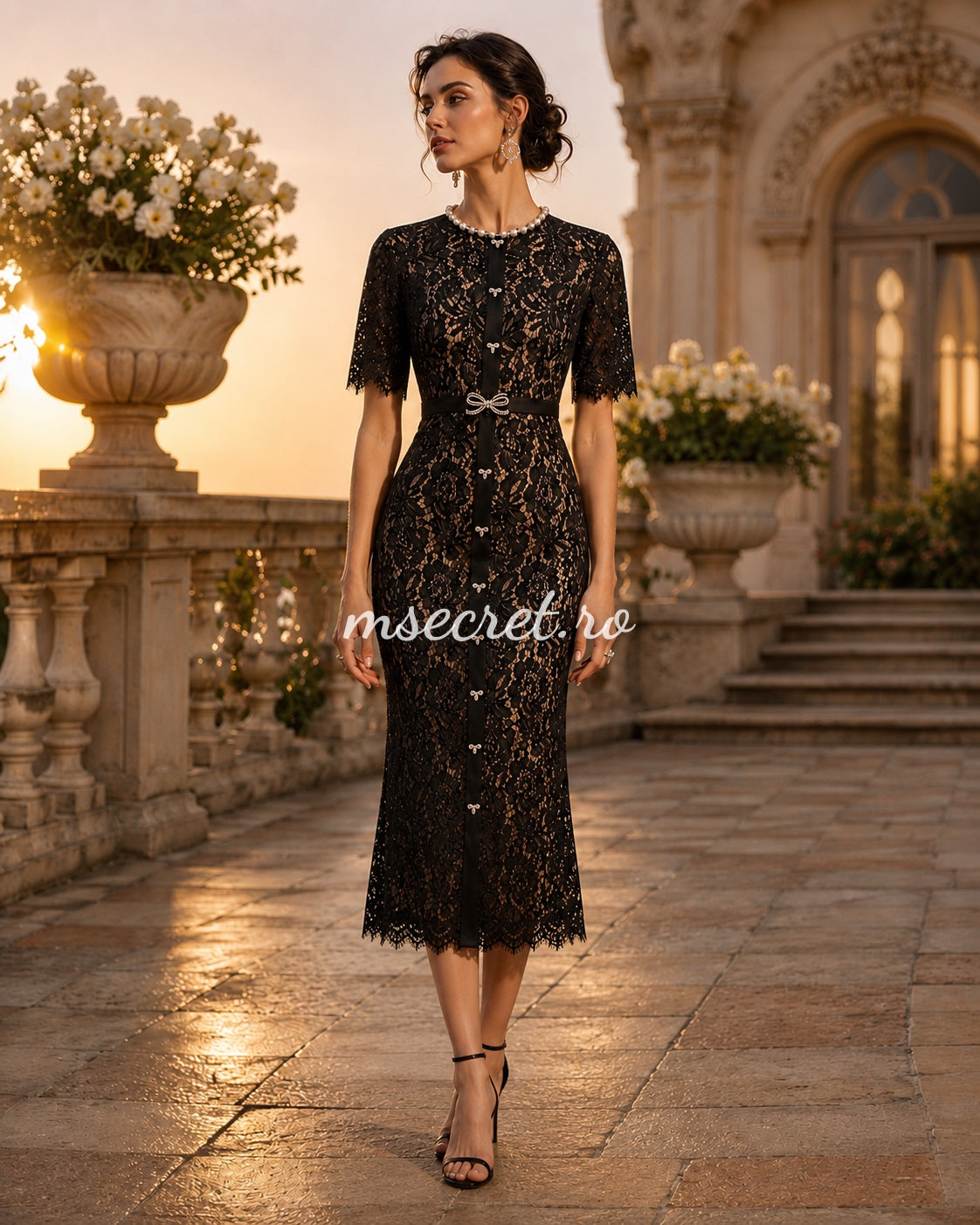 Black lace dress with beaded details