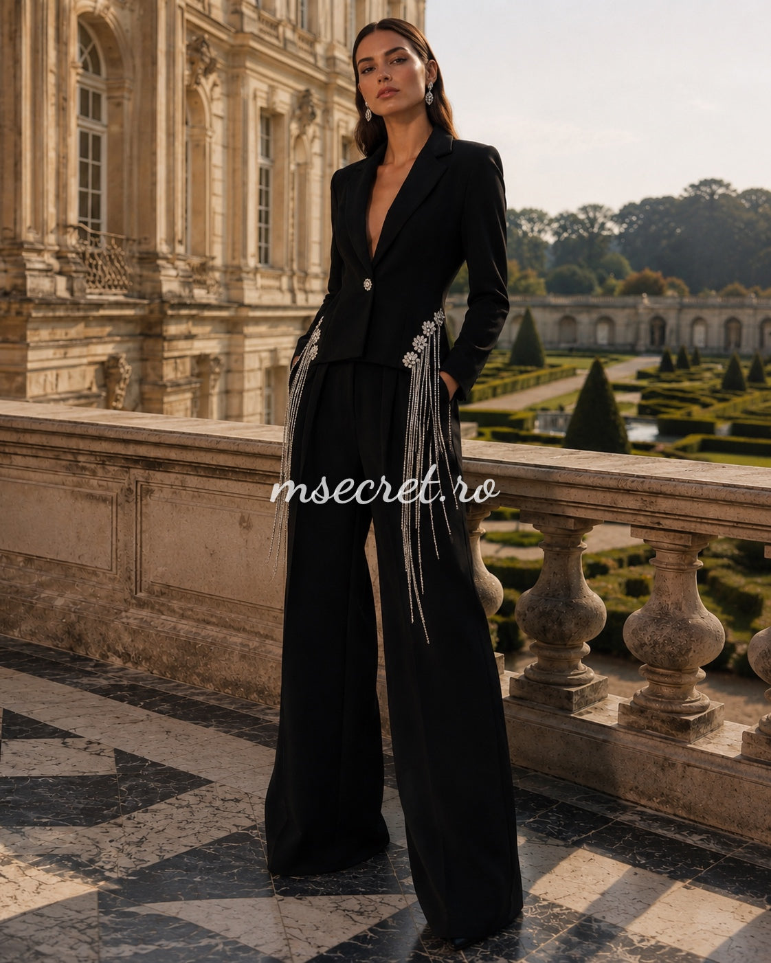 Elegant black suit with a jacket and flared trousers