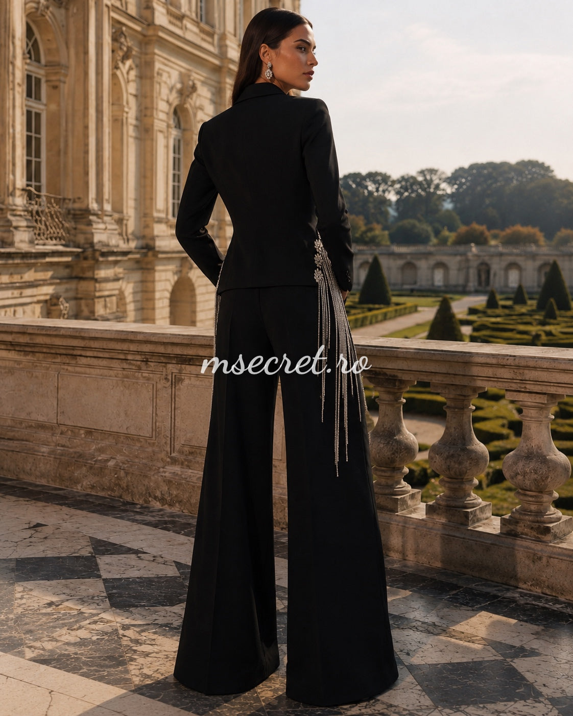Elegant black suit with a jacket and flared trousers