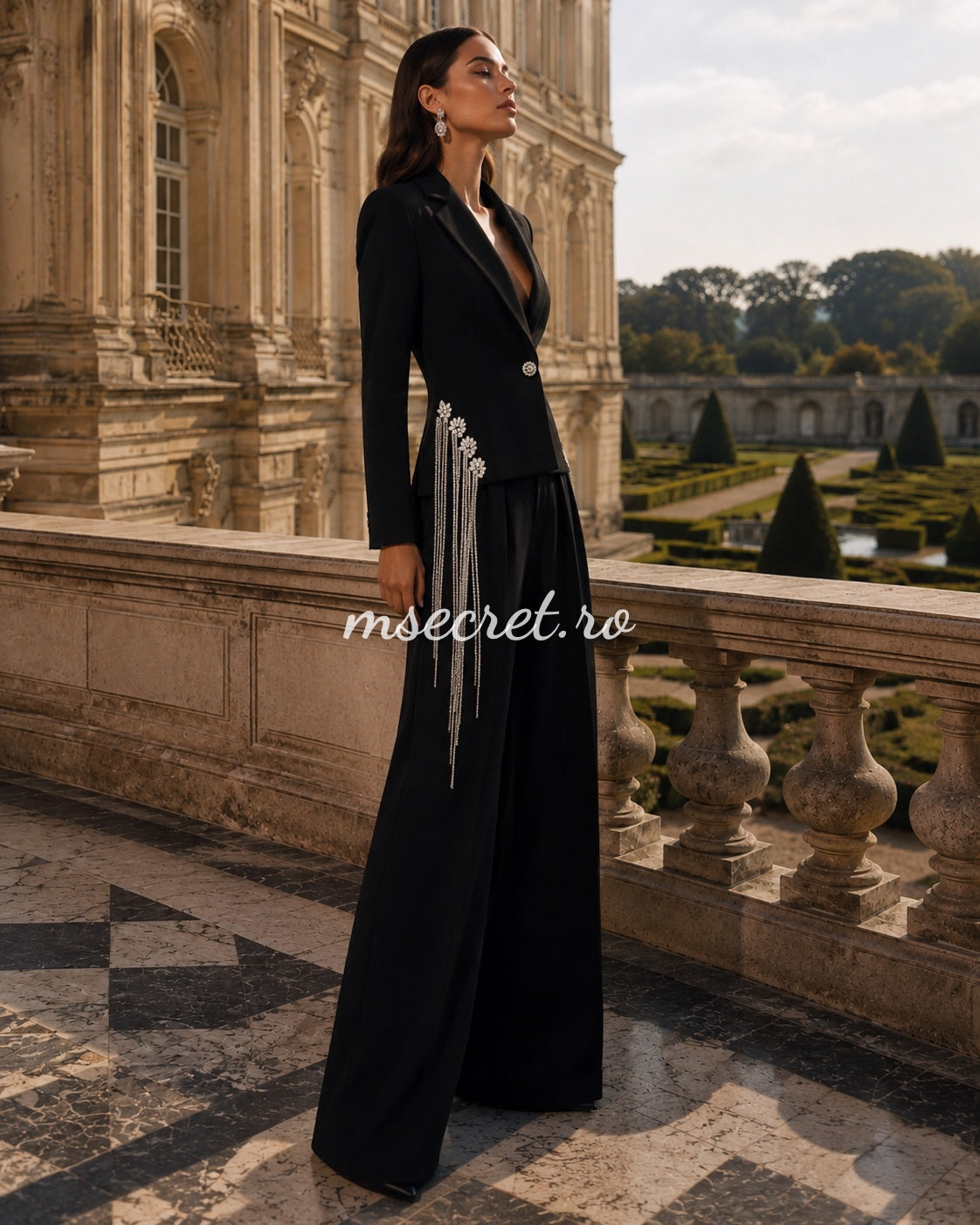 Elegant black suit with a jacket and flared trousers