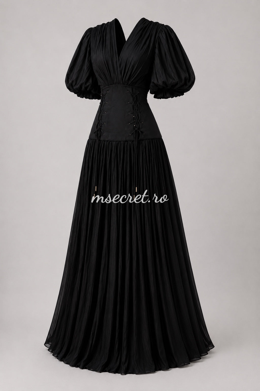 Elegant long black dress with a corset and pleated skirt – evening gown with puff sleeves
