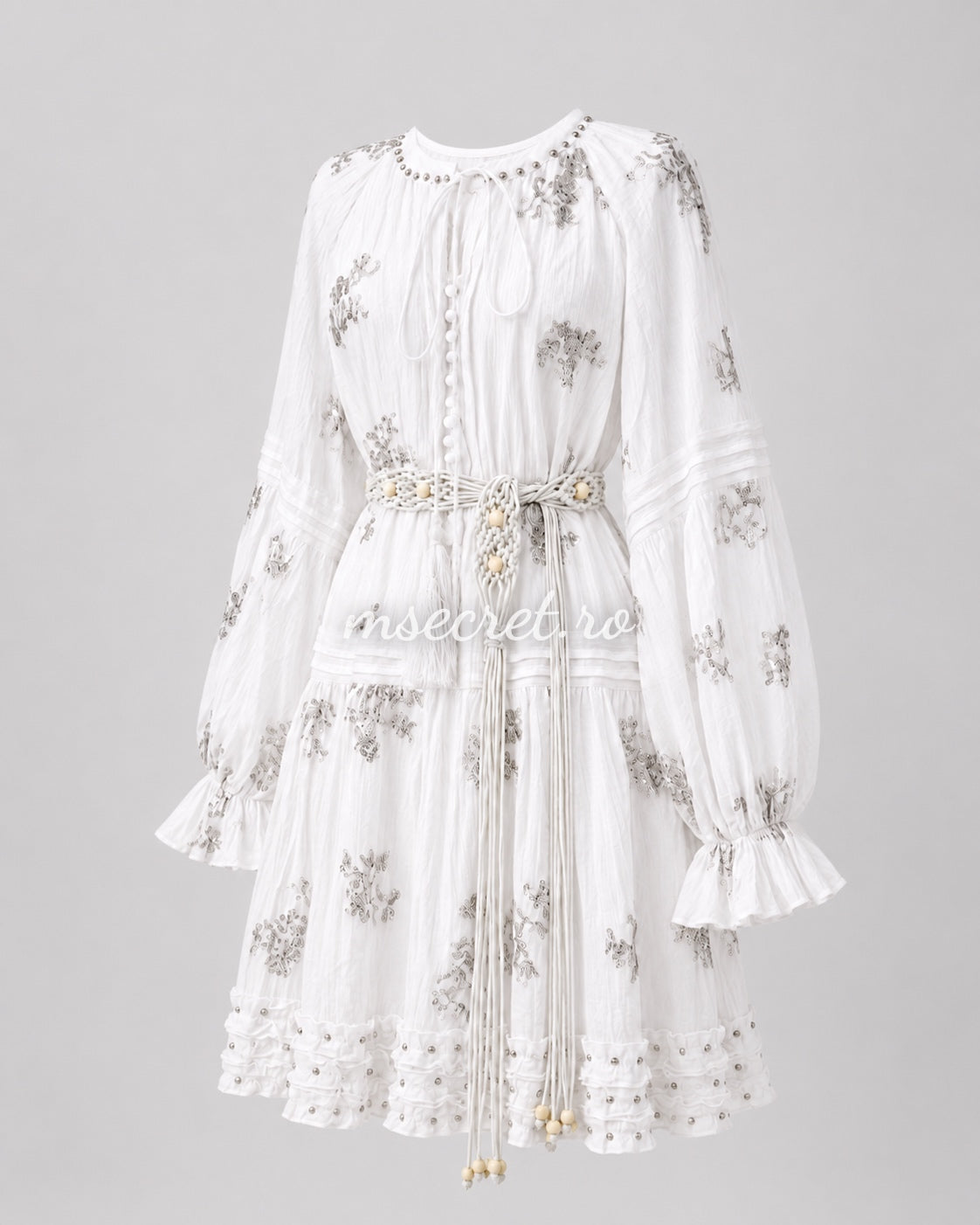 Short white dress with sequins and decorative belt
